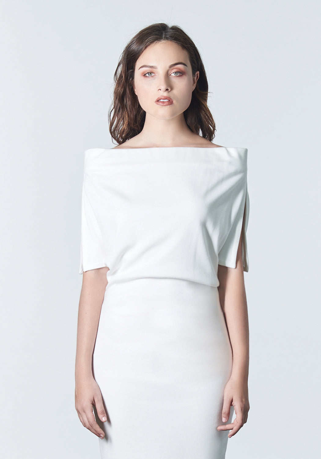 Fall, Autumn, Winter cocktail or work fitted knit dress. Made of stretch tencel. The perfect "little white dress"