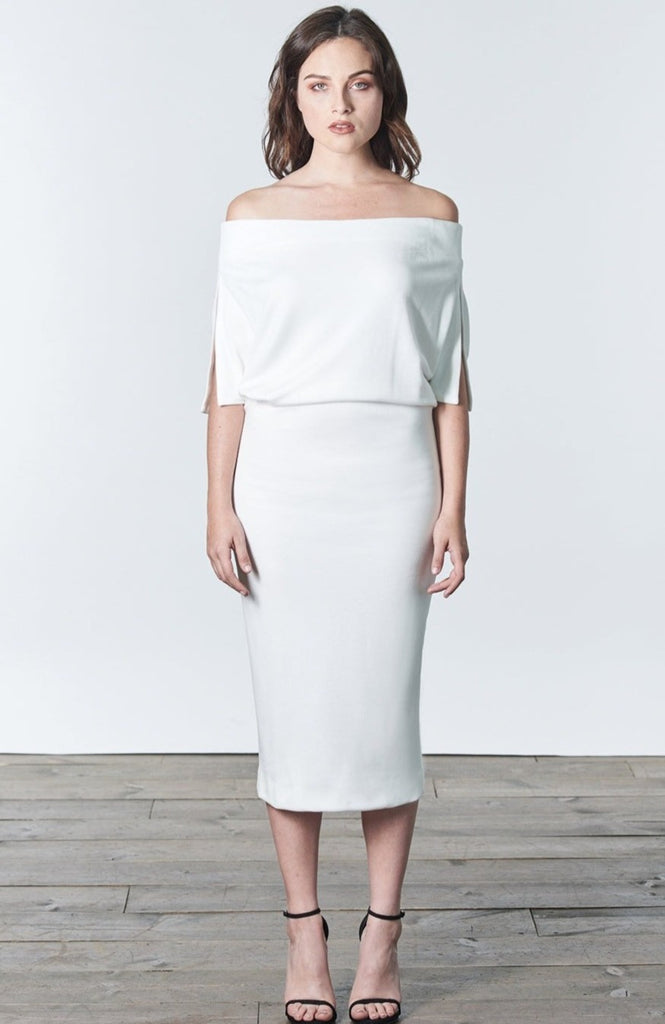 Fall, Autumn, Winter cocktail or work fitted knit dress. Made of stretch tencel. The perfect "little white dress"