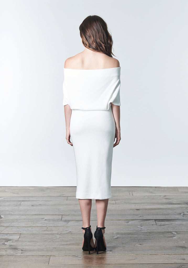 Fall, Autumn, Winter cocktail or work fitted knit dress. Made of stretch tencel. The perfect "little white dress"