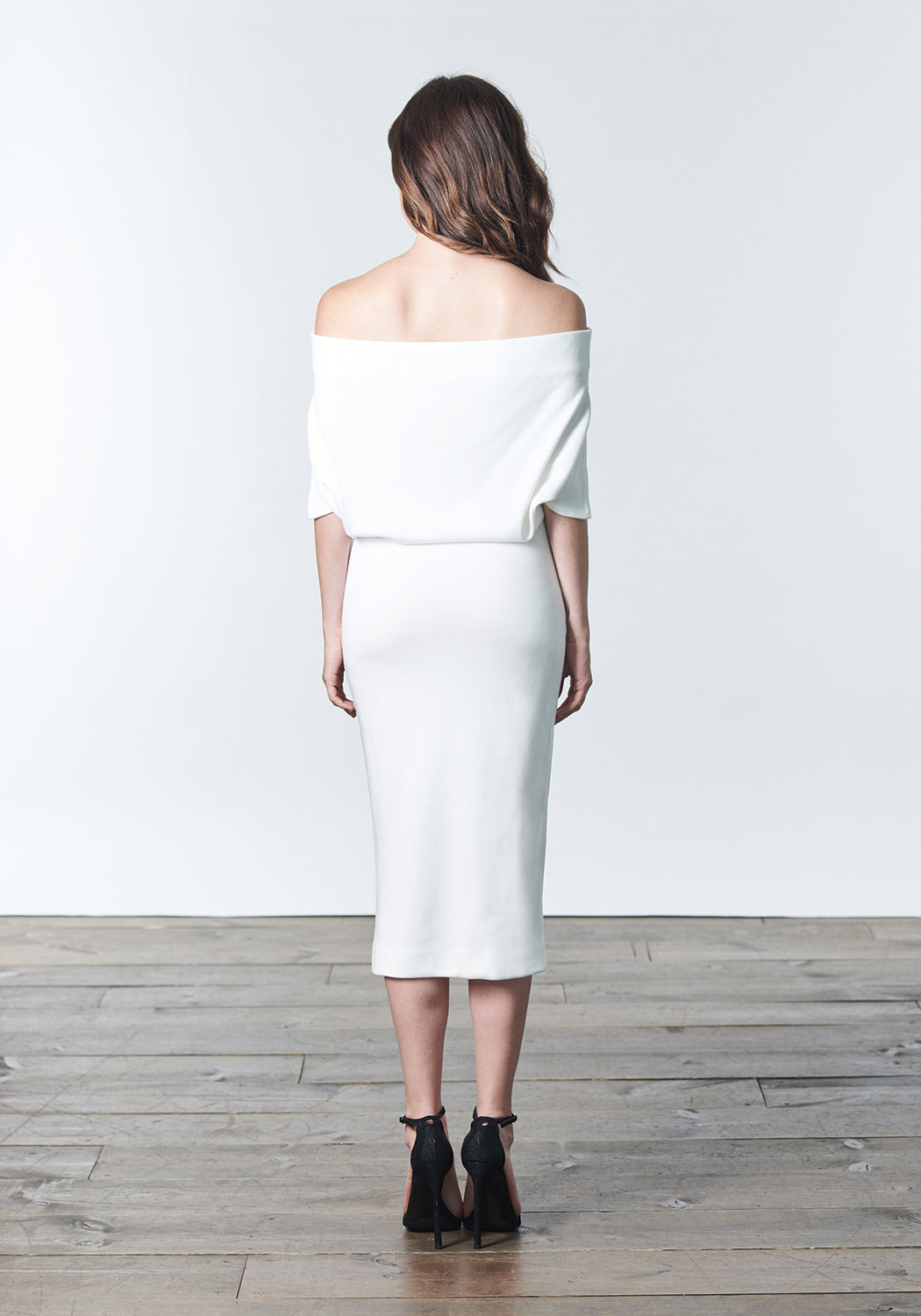 Fall, Autumn, Winter cocktail or work fitted knit dress. Made of stretch tencel. The perfect "little white dress"