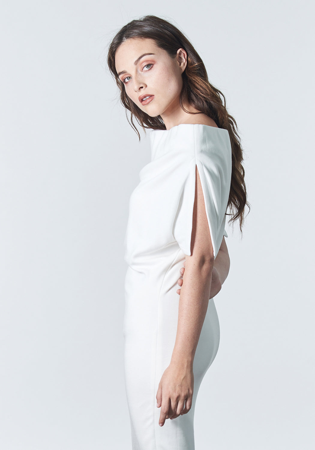 Fall, Autumn, Winter cocktail or work fitted knit dress. Made of stretch tencel. The perfect "little white dress"