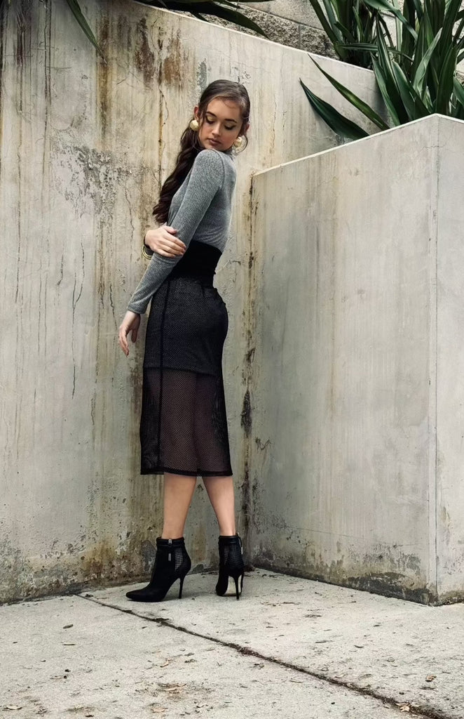 Woman's black mesh skirt