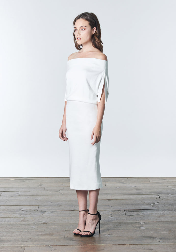 Fall, Autumn, Winter cocktail or work fitted knit dress. Made of stretch tencel. The perfect "little white dress"
