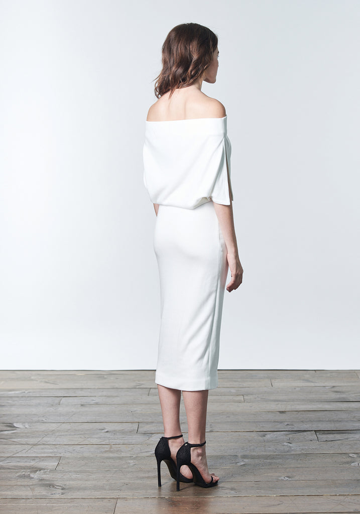 Fall, Autumn, Winter cocktail or work fitted knit dress. Made of stretch tencel. The perfect "little white dress"