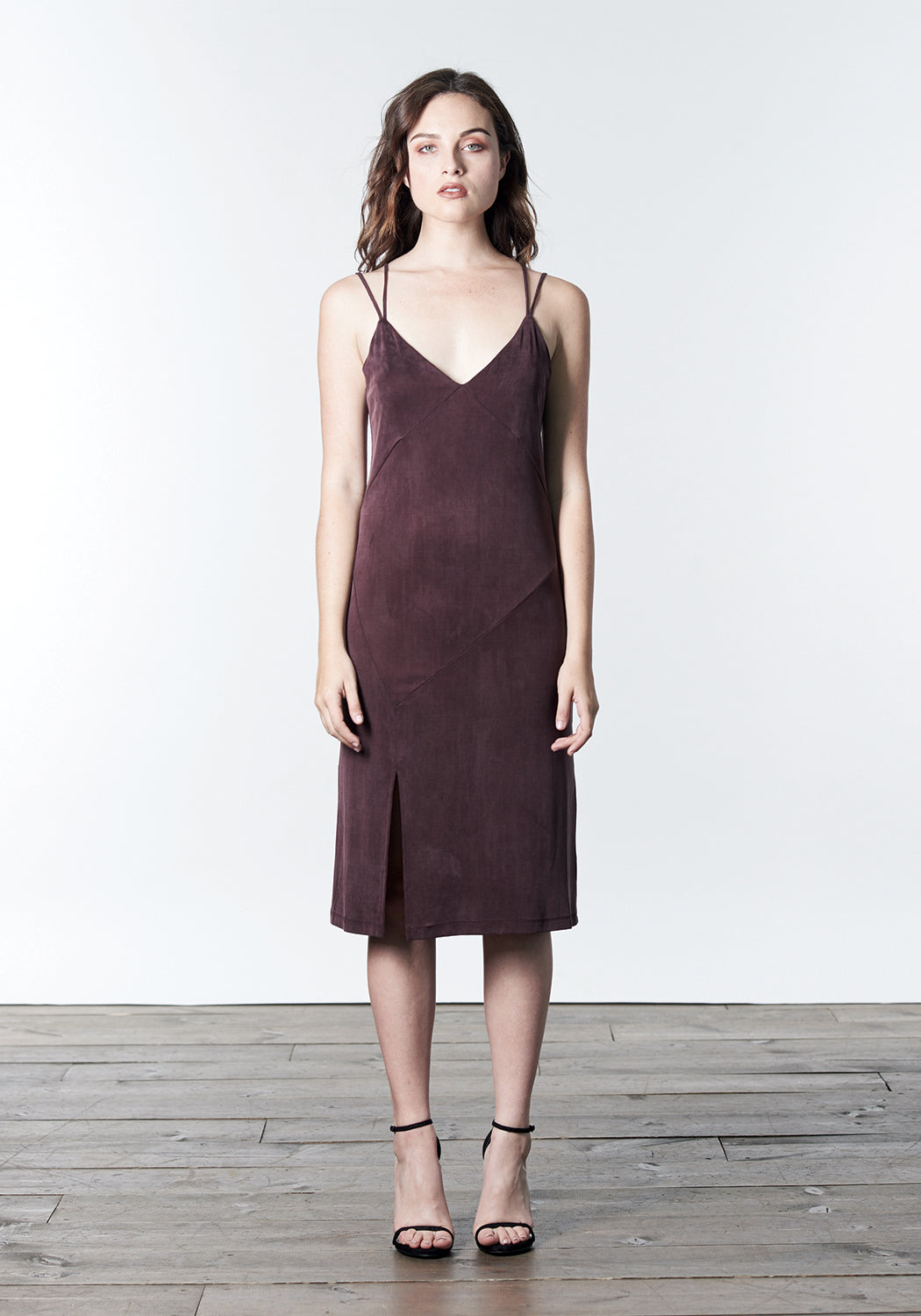 Maroon burgundy, midi-length, slip dress with slit.