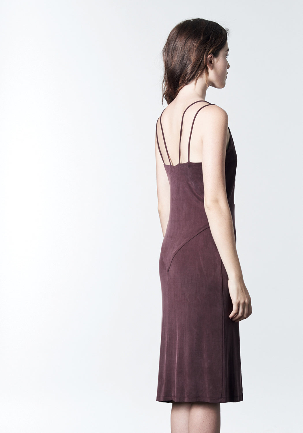 Deep mauve, maroon, burgundy, midi-length, slip dress with slit.