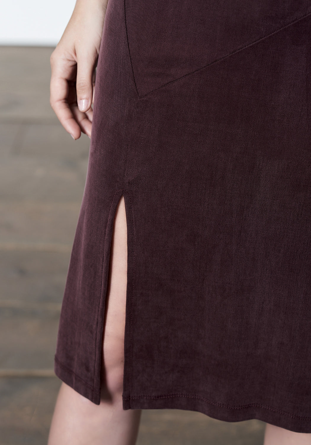 Deep mauve, maroon, burgundy, midi-length, slip dress with slit.