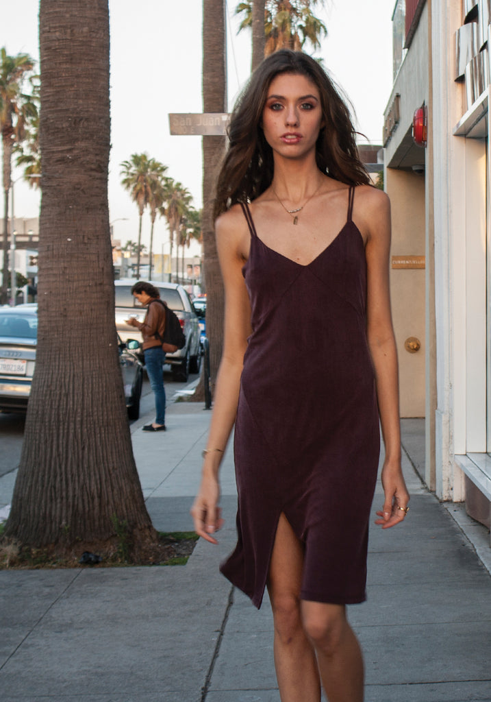 Deep mauve, maroon, burgundy, midi-length, slip dress with slit.