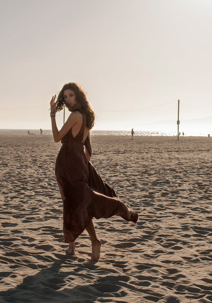 Long, winter maxi dress in brown, cognac color that can be dressed up and worn as a gown to black tie or other evening event or dressed down for daytime looks.