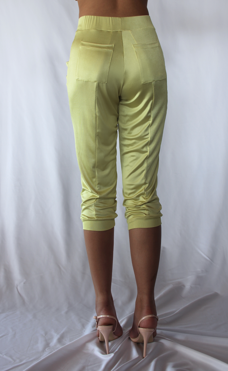 Back view of yellow silky knit lounge pant.