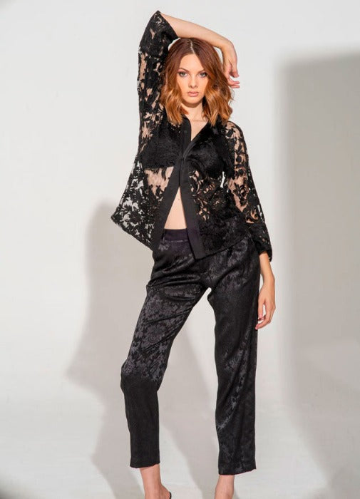 Woman's black embroidered button down top
