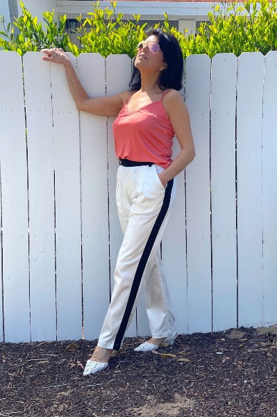 salmon silk tank and white tux pant