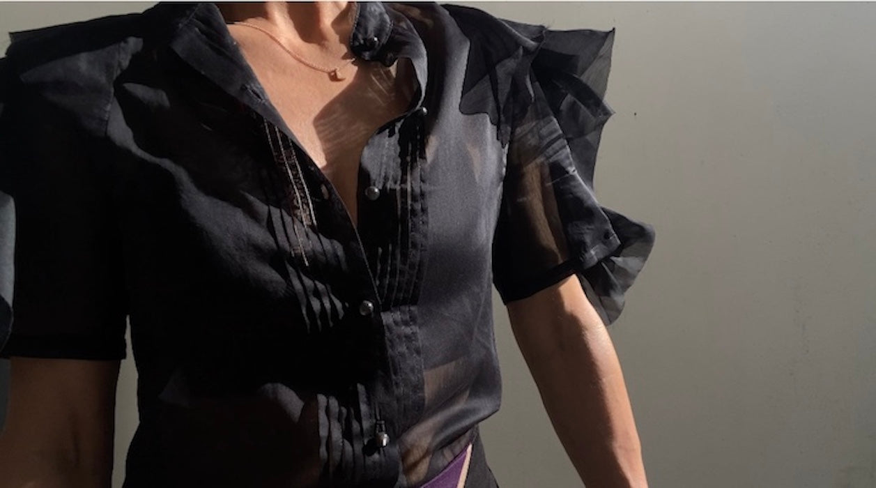 Woman's semi-sheer silk top.