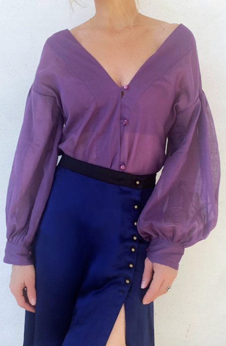 Woman's purple long sleeve summer top.