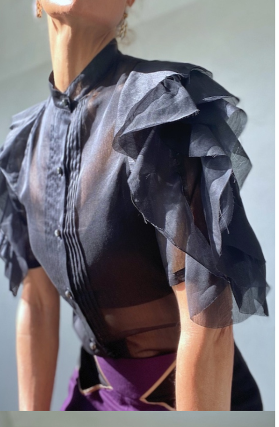 Woman's silk ruffle sleeve summer top.