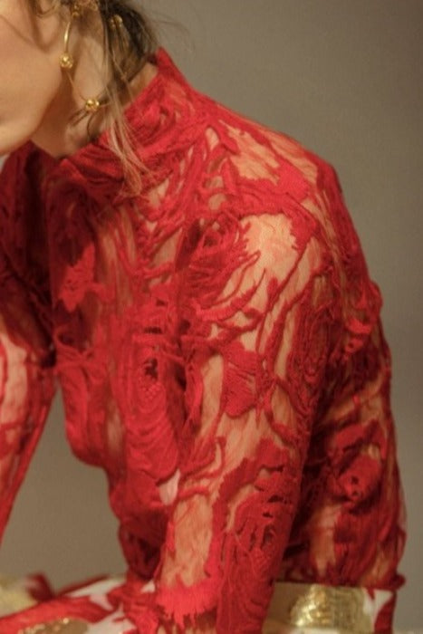 Woman's fuchsia lace top